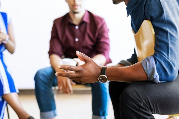 People in a recovery support group meeting — signs you need a halfway house after rehab